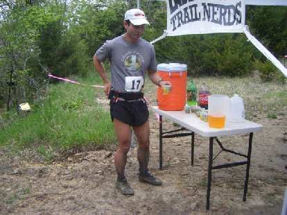Filling up my four-ounce flasks with Succeed sports drink.  I drank about 13 pounds of fluids during the race.