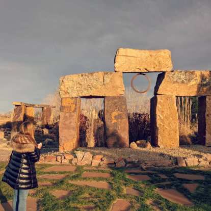 Andrea taking a photo of Clonehenge, also known as Colorado's Stonehenge, the Rock Garden.