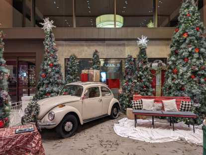A vintage beige Volkswagen Beetle inside the Foothills Mall, where we got a couples massage.