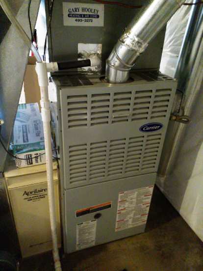 The furnace back together. I also cleaned up the condensate drain pipe a bit.