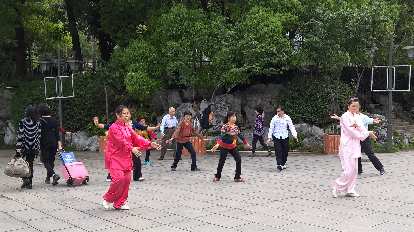 Local Taiwanese doing tai chi at Zuohai Park in Fuzhou, China.