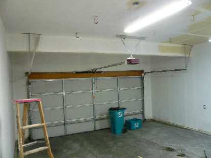 [Intermediate stage] Almost done applying white primer to every wall and ceiling surface.