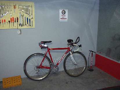 The Italian corner, with the Silca tire pump, Campagnolo-laden Cannondale, and an "Alfa Romeo Parking Only" sign. (01 Jun 2004) The Italian corner, with the Silca tire pump, Campagnolo-laden Cannondale, and an "Alfa Romeo Parking Only" sign.