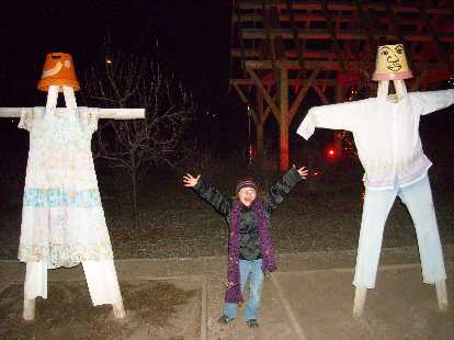 Faith and two scarecrows.