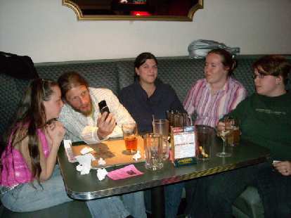 Photo: Ryan, Nick, Dana, Sei and Corinna hanging out in a booth to watch.