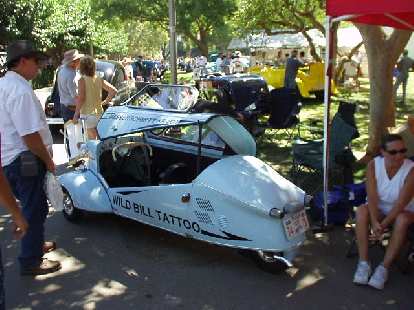 This is a Messerschmitt 3-wheeled vehicle, owned by Wild Bill Tattoo.  It has 10 hp and is good for 95 mpg!