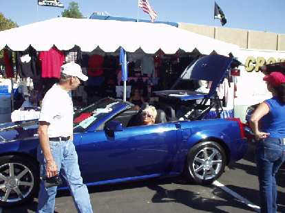 There were modern vehicles too, including this Cadillac XLR in which this lady was giving a demo of its power roof. There were modern vehicles too, including this Cadillac XLR in which this lady was giving a demo of its power roof.
