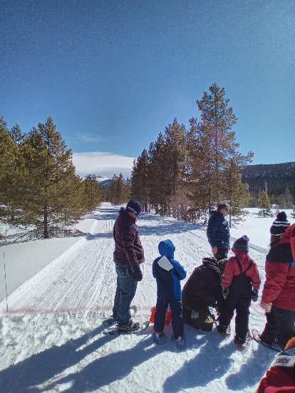 A few people waiting for the start of the 2020 Gould Snowshoe Stomp 5k. A few people waiting for the start of the 2020 Gould Snowshoe Stomp 5k.