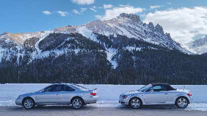 Silver Acura CL and Audi TT Roadster Quattro a couple miles west of Cameron Pass in the Poudre Canyon.
