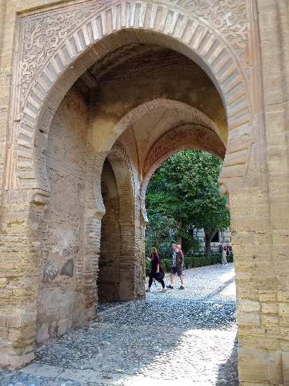 Arched stone passageway at the Alhambra.