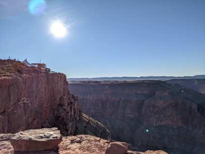 The Guano Point Café can be seen on the cliff on the left.