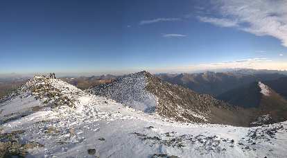 The summit of Grays Peak (left) with Torreys Peak beyond (center of photo). The summit of Grays Peak (left) with Torreys Peak beyond (center of photo).