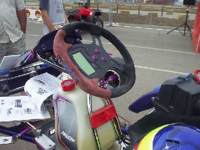 Photo: The trip computer in the steering wheel can display split times, current speed (when used with a wheel sensor), etc.  The gas tank is under the steering wheel.