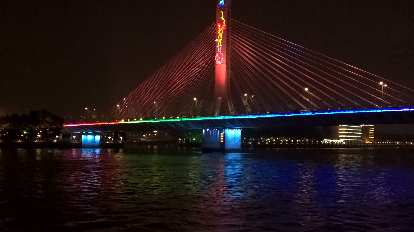 Lighted bridge on Inner Ring Rd. over the Zhujiang River as seen from a cruise ship.