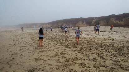A Boot Camp for teens on the beach of Half Moon Bay.