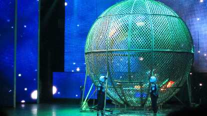 Four motorcyclists rode upside down in this giant sphere. Four motorcyclists rode upside down in this giant sphere.