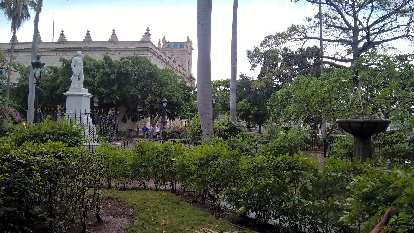 Parque Céspedes near Plaza de Armas, with a white marble statue of Carlos Manuel de Céspedes.