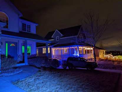 I didn't put up any Christmas lights but had a Phillips Hue light glow green in the living room. Andrea said it looked "alien-like."