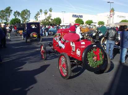 I don't know the make of this 2-seat racer following a whole line of Fords, but it sure exuded the holiday spirit.