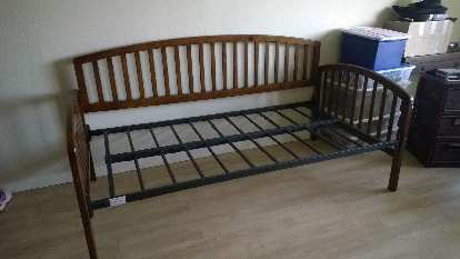 assembled bedframe with sideboard