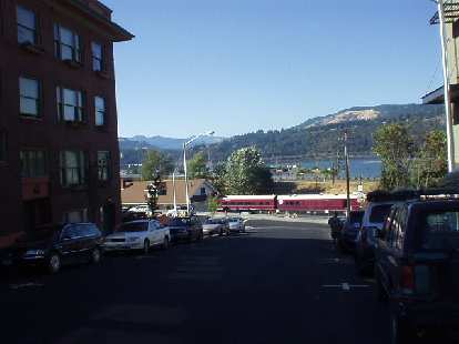 Downtown with the Columbia Gorge River in the background.  Amtrak runs through here (from Portland to Chicago), though it is endangered due to the Bush administration's proposal to give Amtrak $0 of funding in 2006.