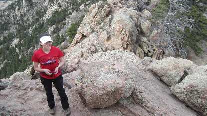On top of Horsetooth Rock. Maureen wearing red shirt on Horsetooth Rock