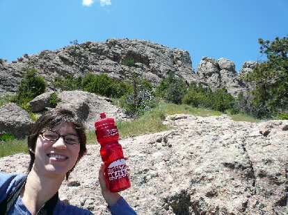 Sarah holding up a Horsetooth Half Marathon bottle which has a pretty accurate depiction of Horsetooth Rock. Sarah holding up a Horsetooth Half Marathon bottle which has a pretty accurate depiction of Horsetooth Rock.