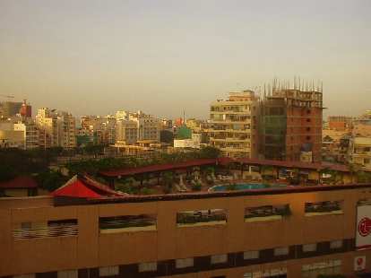 The view of the roof pool at the New World Hotel across the street from my Hai Long I hotel room. (06 Jul 2006) The view of the roof pool at the New World Hotel across the street from my Hai Long I hotel room.