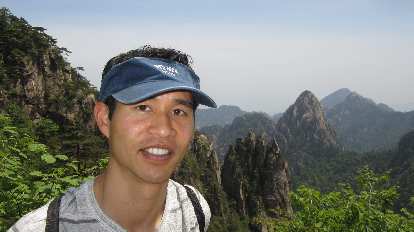 Felix Wong in front of the "five fingers" in the Huangshan Mountains. Felix Wong in front of the "five fingers" in the Huangshan Mountains.
