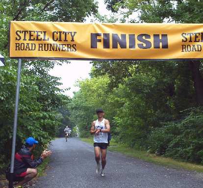 Felix Wong completing the 5k race in 18:58. Photo: Steel City Road Runners. Felix Wong completing the 5k race in 18:58.