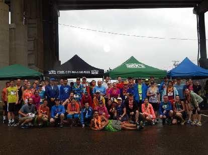 The participants of this rainy 5k race. Photo: Steel City Road Runners. The participants of this rainy 5k race.