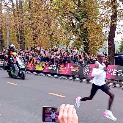 Eliud Kipchoge sprinting in the final 50 meters of the INEOS 1:59 Challenge.