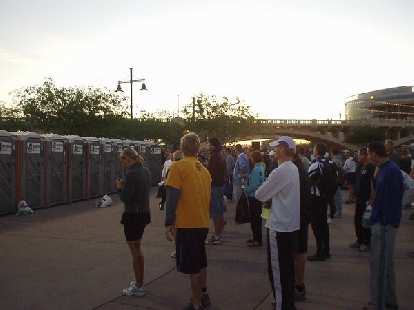 Waiting in line for the portapotties.