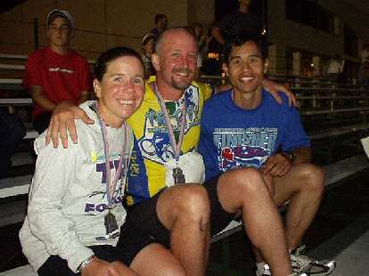 We did it!! Ironman Sharon, Tom, and Felix Wong together after the race. (29 Jun 2003) We did it!! Ironman Sharon, Tom, and Felix Wong together after the race.