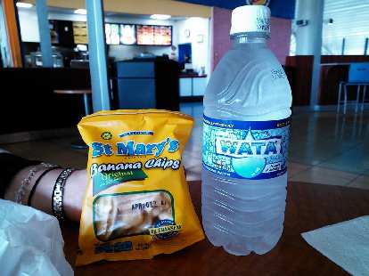 St. Marty's Banana Chips and Wata (water). Leanne knows the Johnson family who makes the banana chips and as a result of their fortune, "own half the island."