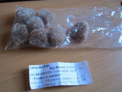 Tamarind balls with seeds inside.