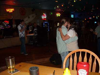 Nick and the birthday girl dancing.