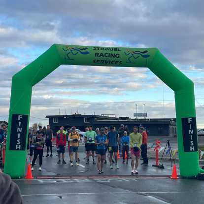 Toeing the start line of the 2022 Kenai River Marathon.