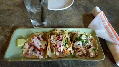 Tacos with redfish, camarones (shrimp), and pato (duck) at Babalu Tapas & Tacos in Knoxville, Tennessee.