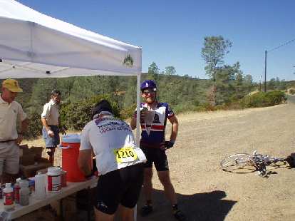 Mile 94, 12:22 p.m.: My friend Adam Paulaul", also from Fremont and a California Triple Crown winner, at the water stop. Mile 94, 12:22 p.m.: My friend Adam Paulaul", also from Fremont and a California Triple Crown winner, at the water stop.