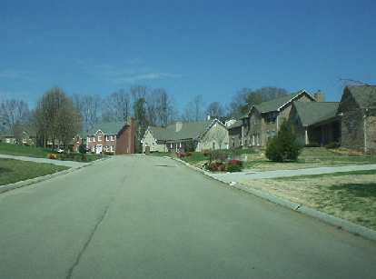 About 7 miles from Knoxville and 5 miles from Maryville were nice new homes such as these.  The neighborhoods in the west part of Knoxville (north of the Tennessee River) also seemed pretty nice (Miles 6-10 in the marathon).