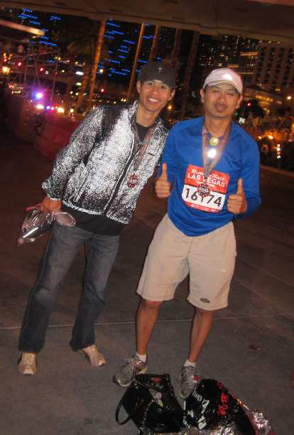 Felix Wong and Bandy after completing the Las Vegas Marathon. Photo: Sara Noy. Felix Wong and Bandy after completing the Las Vegas Marathon.