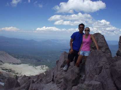 Ryan and Jamie at the top, with the southeasterly view in the background.