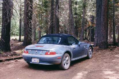 [Sep  2001] Doing a little (well, over 12 miles) of off-roading in Tahoe to get to a climb.  She was a tough little car!
