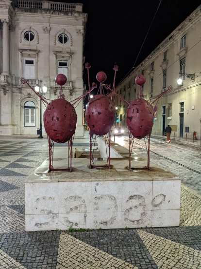 Red street art sculptures near City Hall Square in Lisbon, Portgual.
