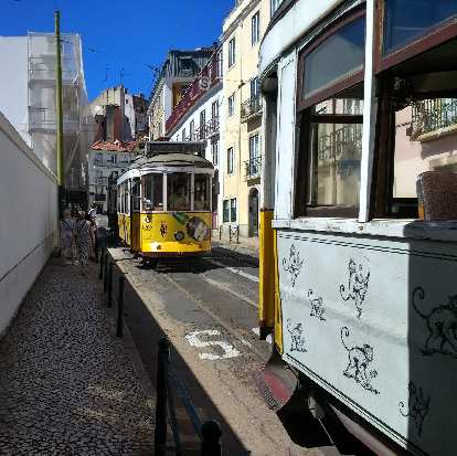 One of the cable cars that went through Alfama broke down, causing a back up of cable cars. Everyone had to get out and walk. One of the cable cars that went through Alfama broke down, causing a back up of cable cars. Everyone had to get out and walk.