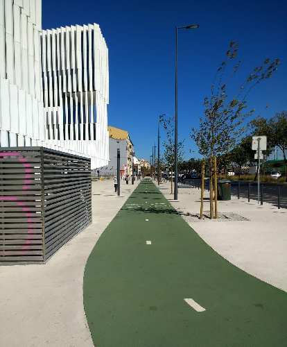 Bike path along Av. 24 de Julho in Lisbon, Portugal. Bike path along Av. 24 de Julho in Lisbon, Portugal.