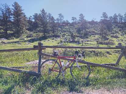 Mile 17: My red Cannondale 3.0 in front of Piano Ridge, a popular bouldering area in Fort Collins. red Cannondale 3.0, Piano Ridge, Fort Collins