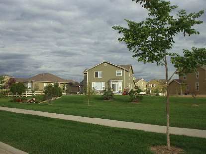 Many newer tract home developments are popping up with "large homes, small lots, big life".