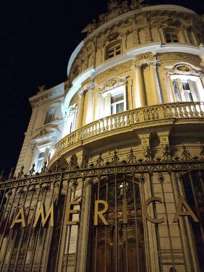 The Casa de America at night in Madrid.